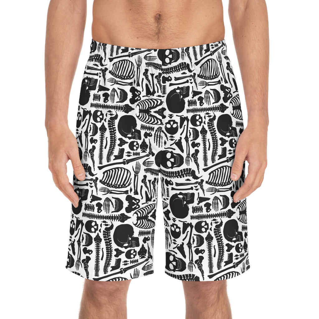 Person wearing black and white patterned shorts on a white background