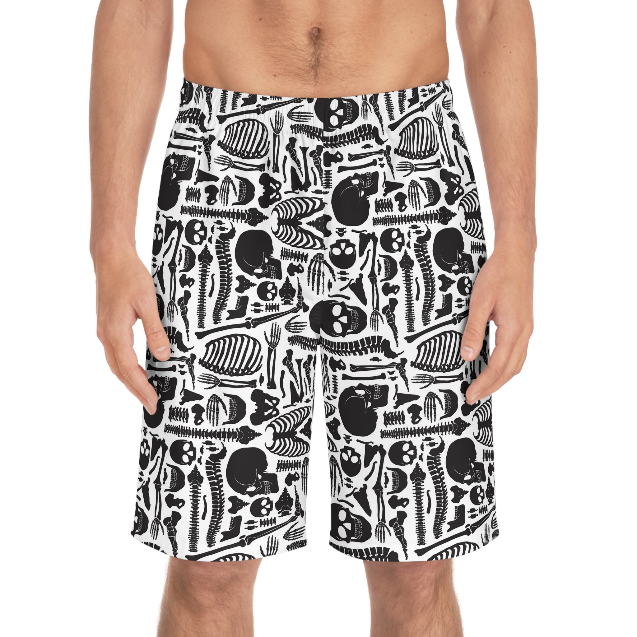 Person wearing black and white patterned shorts on a white background