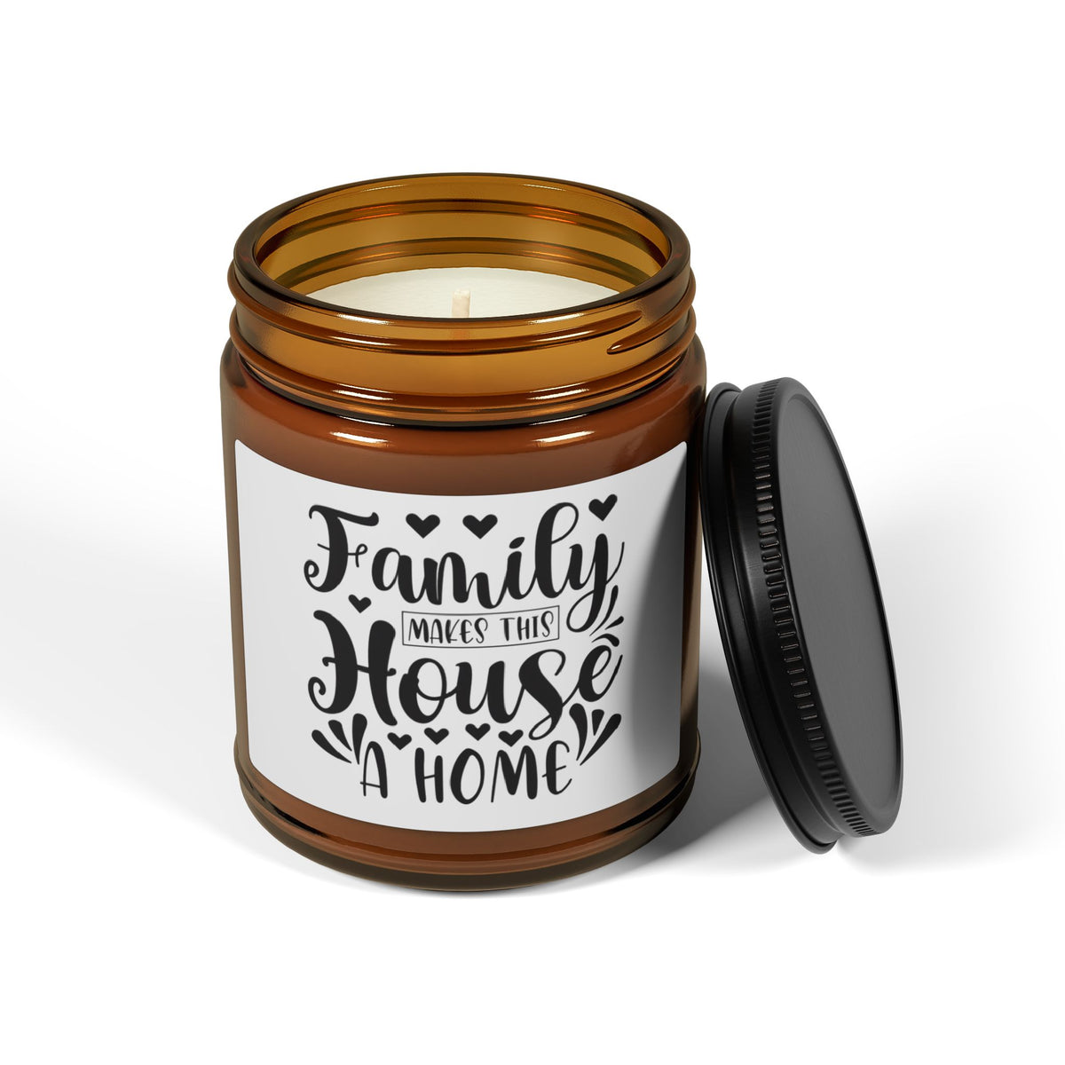 Candle in an amber jar with a decorative label on a white background