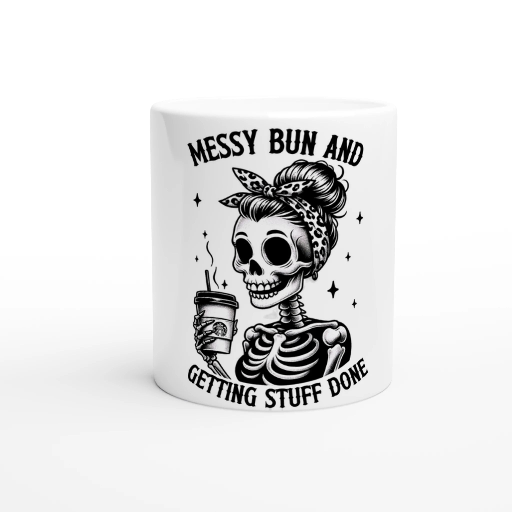 White mug with skeleton design holding a coffee cup and text 'Messy Bun and Getting Stuff Done' on a white background