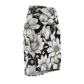 A black pencil skirt featuring a large-scale black and white floral print, shown against a plain white background.