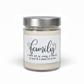 A single-wick jar candle with cream-colored wax and a metallic silver lid, featuring a white label with the word 'family' in black script and the quote 'a little bit of crazy, a little bit of food & a whole lot of love.' on a white background.
