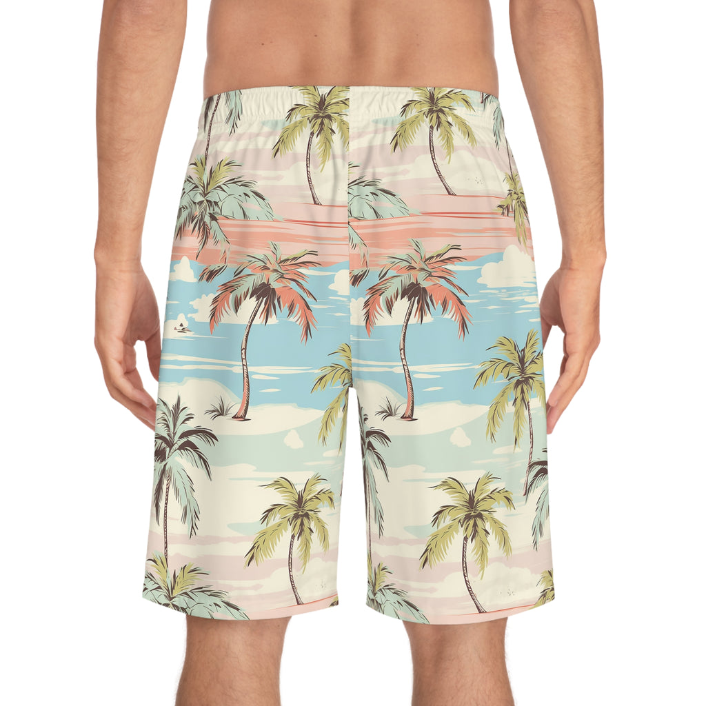 Tropical patterned shorts worn by a person on a white background