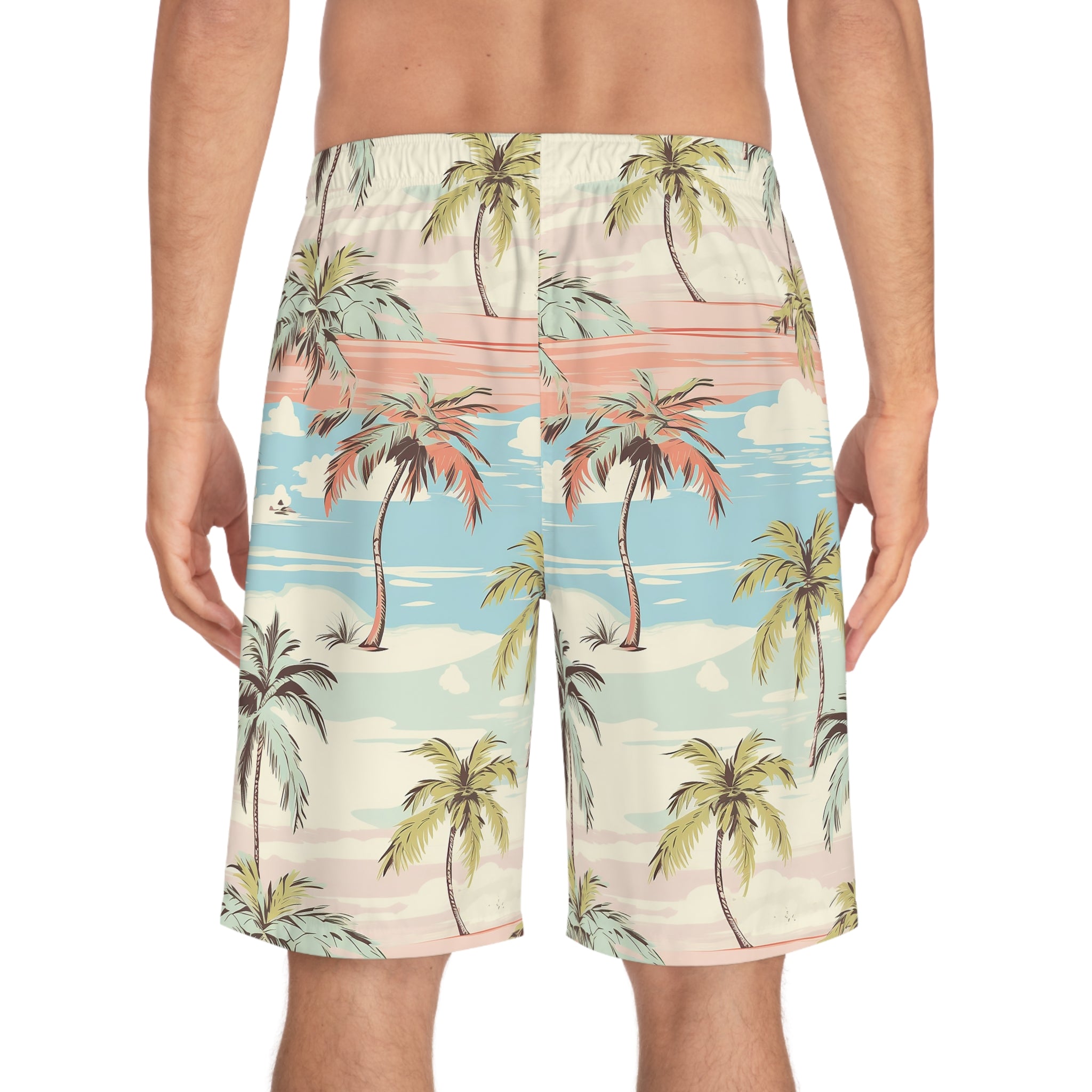 Tropical patterned shorts worn by a person on a white background