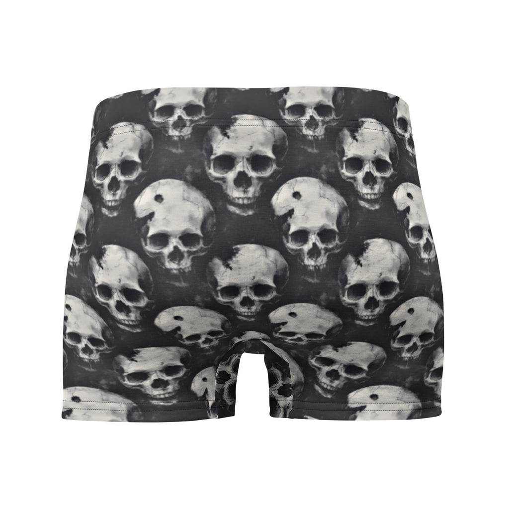 Black and white boxer briefs featuring an all-over repeating skull print, shown against a plain white background.