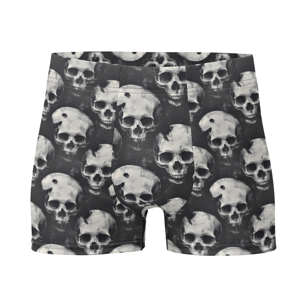 Black and white boxer briefs featuring an all-over repeating skull print, displayed flat against a solid white background.