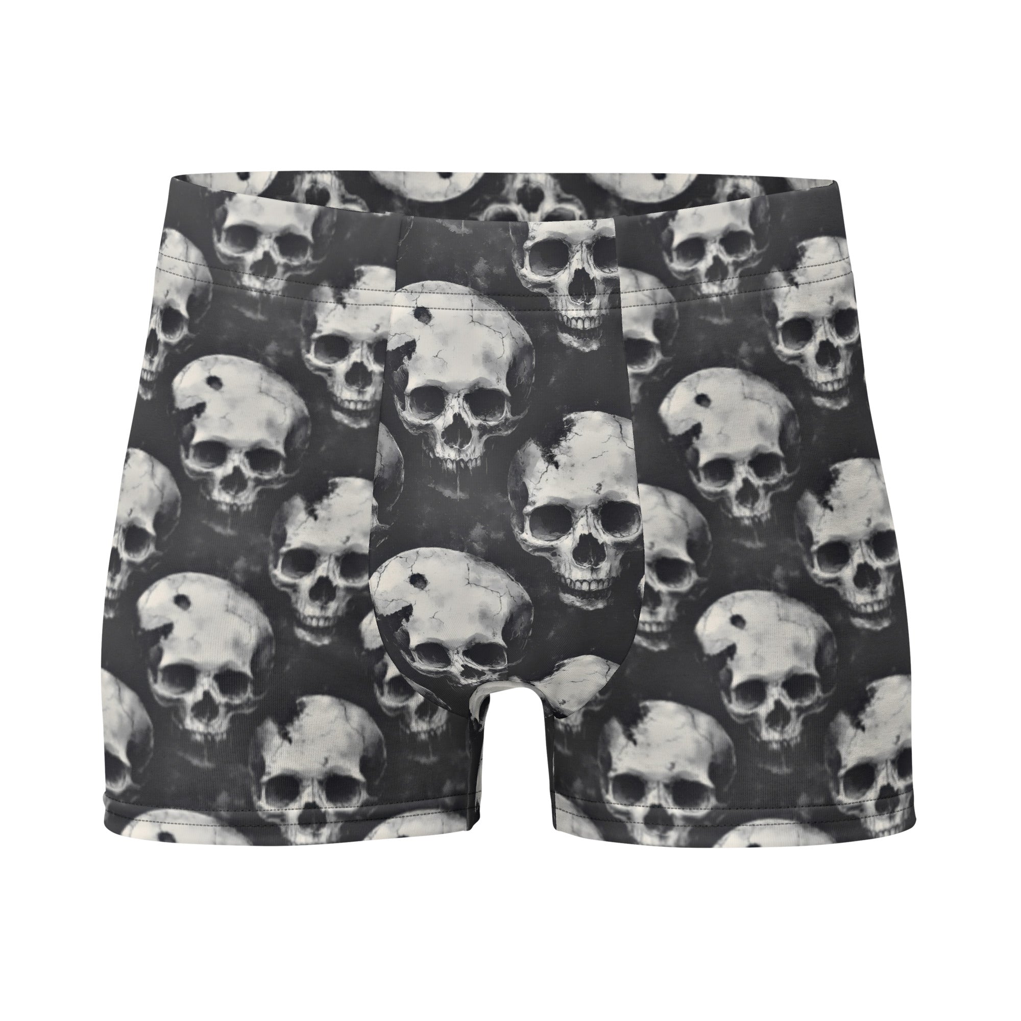 Black and white boxer briefs featuring an all-over repeating skull print, displayed flat against a solid white background.