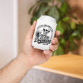 Hand holding a can cooler with a skeleton design and text, blurred indoor background