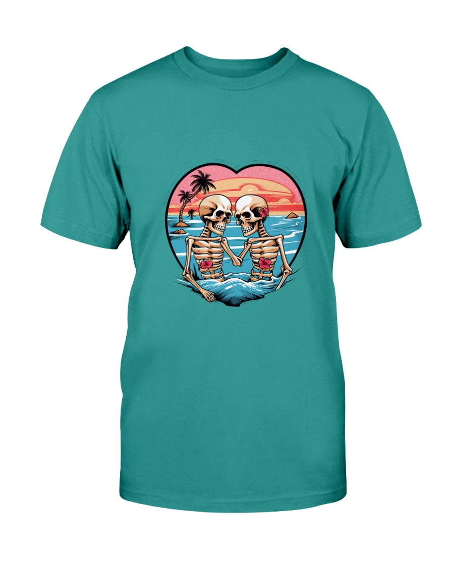 Teal t-shirt with a graphic of two skeletons holding hands on a beach, set against a heart-shaped sunset.