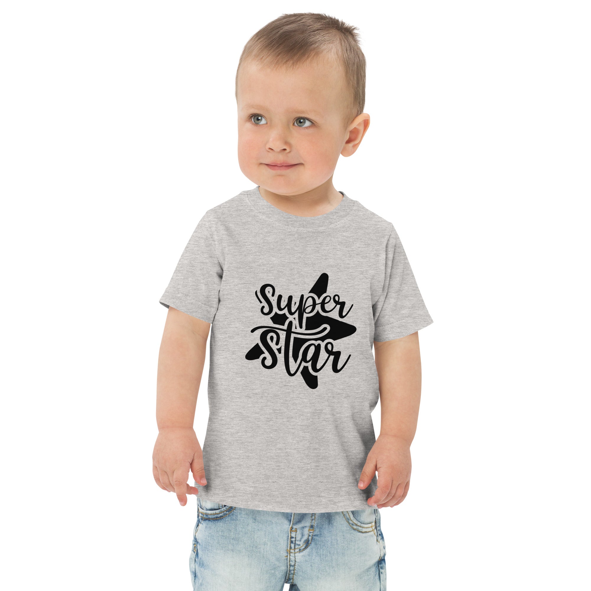 Child wearing a gray t-shirt with 'Super Star' text and star graphic on a white background