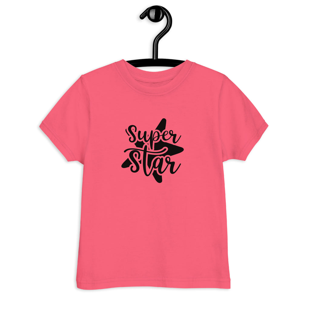 Pink t-shirt with 'Super Star' text on a hanger against a white background