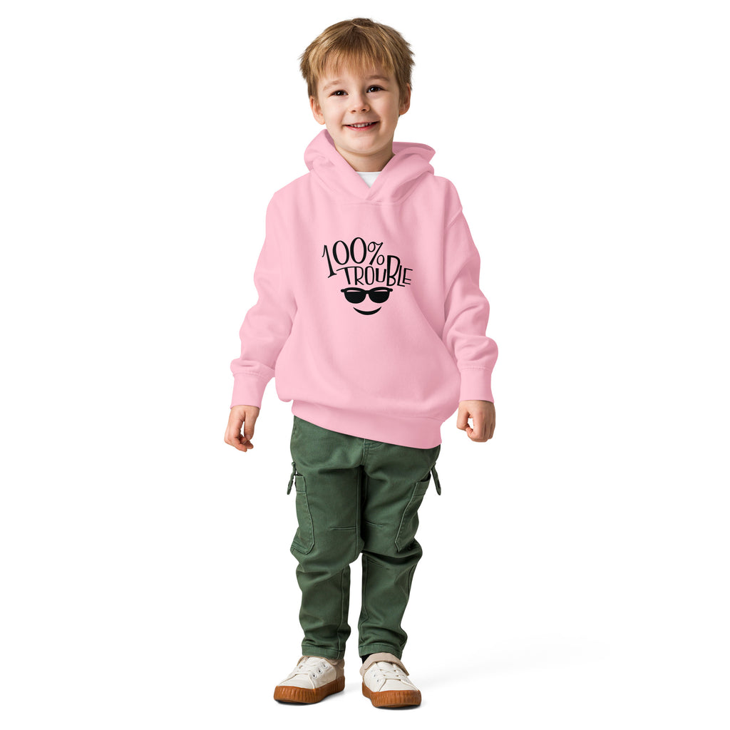 Child wearing a pink hoodie with a graphic design on a white background