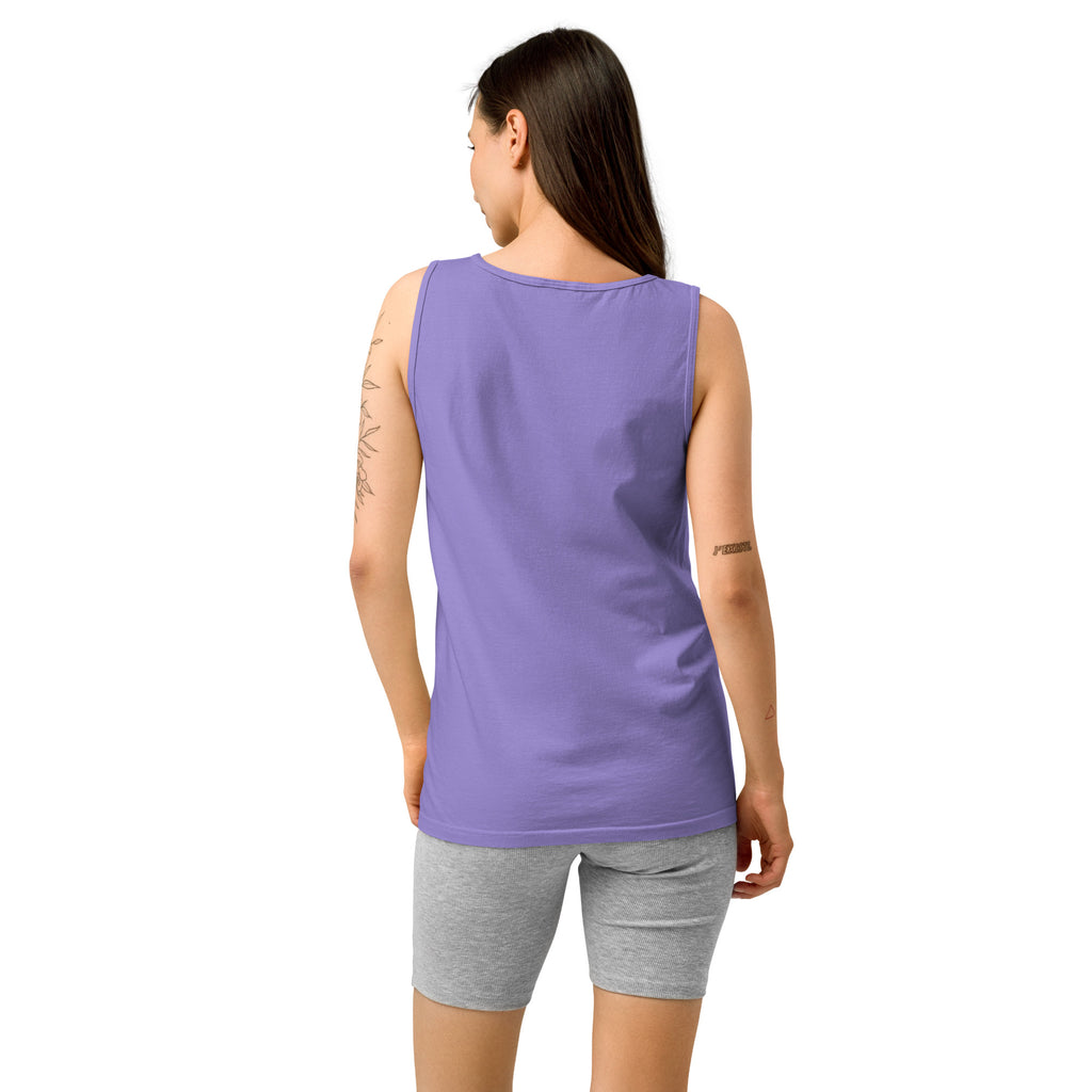 Woman wearing a purple sleeveless top and gray shorts on a white background