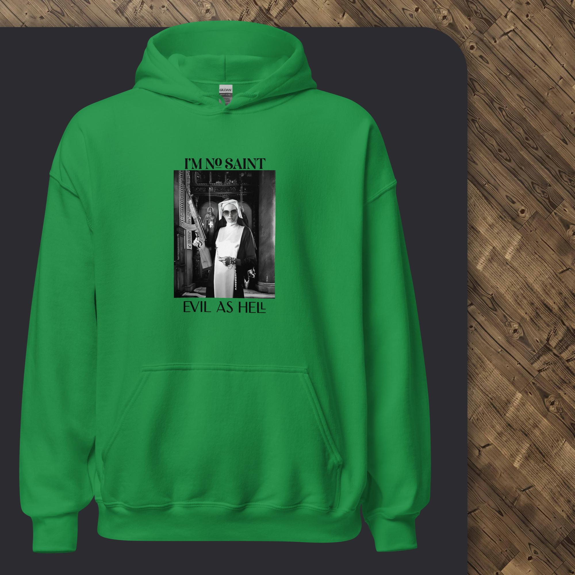 Green hoodie with graphic design on a dark surface
